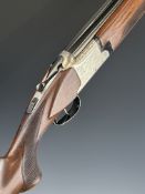 Laurona 12 bore over and under ejector shotgun with engraved hunting scenes and birds to the