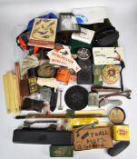 A collection of gun and shooting related items and accessories including shootign glasses,