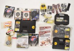 A collection of gun and shooting related items and accessories including Napier System 7000