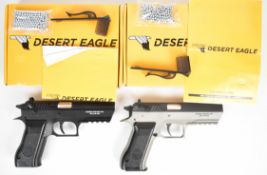 Two Magnum Research Baby Desert Eagle .177 CO2 air pistols, each with monogrammed and textured grips