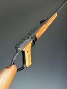 Browning Buckmark .22 semi-automatic rifle with monogrammed wooden pistol grip, adjustable sights,