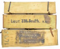 Three canvas and leather bound shotgun carry cases including one with lift out tray revealing