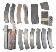 Sixteen various machine gun, rifle and similar magazines, some in military pouch.