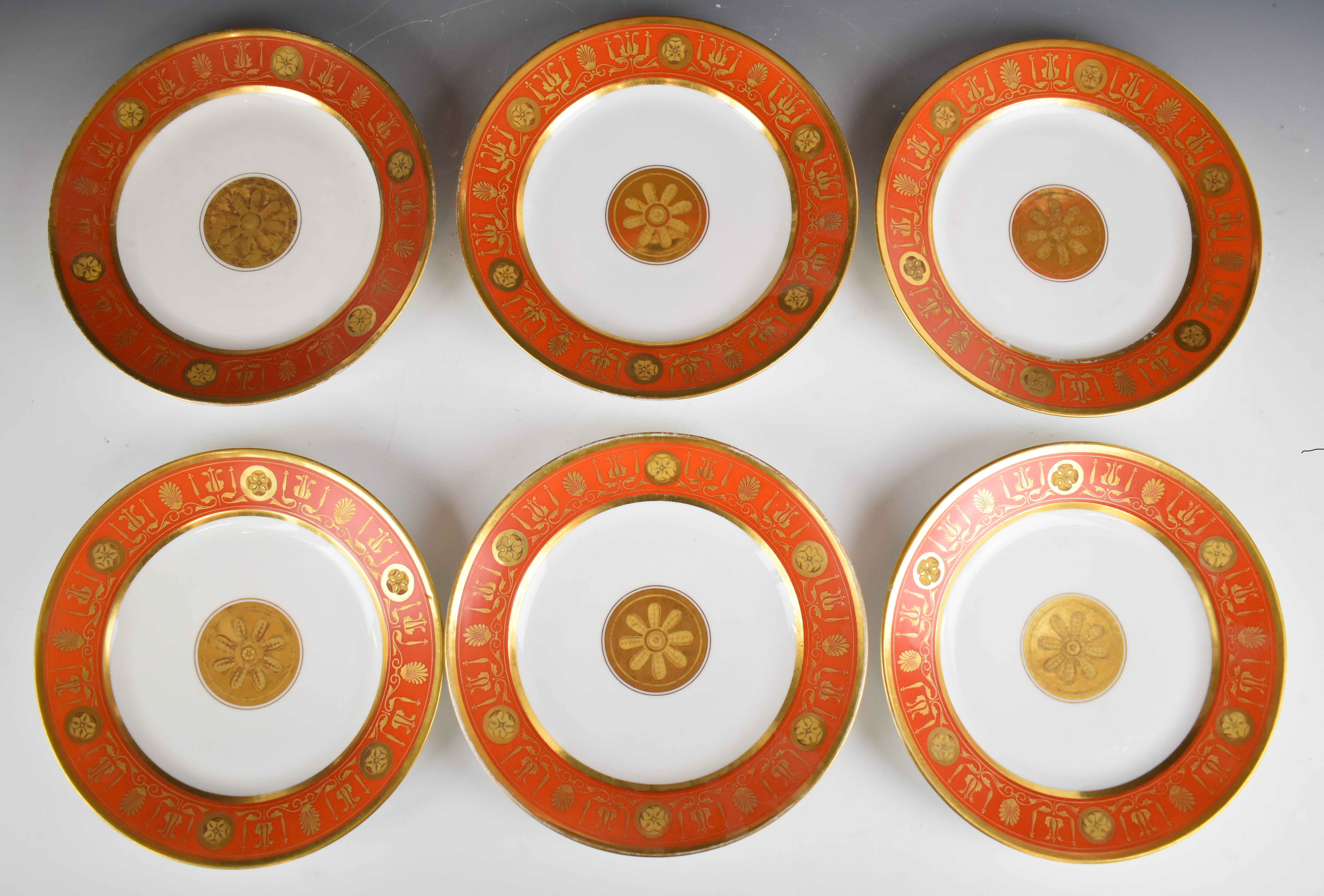 Darte Frères À Paris six 19thC gilded dinner plates, probably from a named service, torn paper label