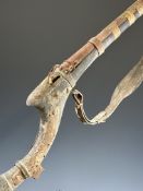 Turkish, Ottoman or Middle Eastern matchlock jezail with engraved brass decoration, leather sling,