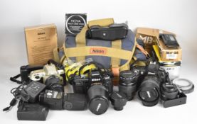 Three Nikon 35mm SLR cameras, lenses and accessories to include D70 with 18-70mm 1:3.5-4.5G ED DX