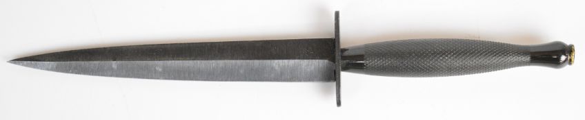 Fairbairn Sykes pattern fighting knife marked with broad arrow and Sheffield England, with 17cm