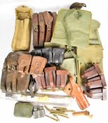Collection of leather and canvas ammunition pouches including German WW1 style, S.M.G style cleaning