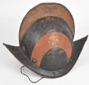 Cabasset 17thC style helmet with high comb, rosette rivets and remnants of leather inner rim