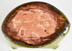 Ewenny Pottery shaped dish with crimped rim and incised script 'Melus Moes Mwy' (Time Is Honey), '