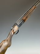 Armi Salvinelli Monza 12 bore over and under ejector shotgun with gold named locks, chequered semi-