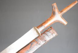 African tribal short sword with wooden grip, 48cm double edged plain blade and decorated leather