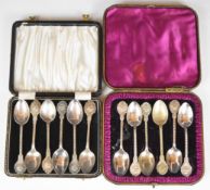 Two sets of six shotgun cartridge or shooting interest tea spoons each marked Kynoch and with lion