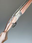 Baikal NX-27E-1C 12 bore over and under ejector shotgun with engraved locks and trigger guard,