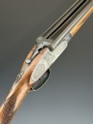 Mendi 12 bore side by side sidelock ejector shotgun with engraved locks, top plate, thumb lever,
