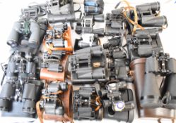 Twenty five pairs of binoculars to include Ross Stepruva 9x35, Hilkinson Comet 15x80, Panorama
