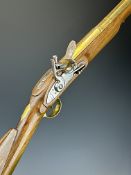 Flintlock blunderbuss with nickel plated lock and hammer, brass trigger guard and butt plate,