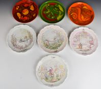 Three Poole Pottery and four Royal Doulton Brambly Hedge plates, largest diameter 21cm