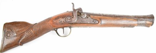Eastern percussion converted from flintlock blunderbuss pistol with carved and chequered grip, brass