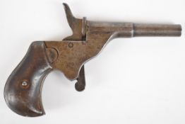 JGA .22 blank firing or starting pistol with named frame, shaped wooden grips and 2.25 inch