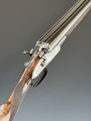 John Rigby & Co of Dublin 12 bore side by side hammer action shotgun with named and engraved lock,