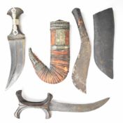 Two Eastern daggers including a Jambiya with ornate scabbard and a Hadendoa dagger, longest blade