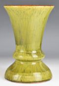 Ewin Jenkins for Ewenny Pottery flared vase with speckled green glaze incised to base 'E Jenkins,
