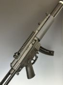 German Sport Guns (GSG) 522 .22 semi-automatic assault style rifle with textured pistol grip,