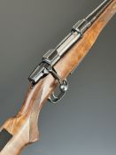CZ 550 .243 bolt-action rifle with chequered semi-pistol grip and forend, scope rail, sound