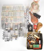 A collection of shooting powders, 9kg of lead shot and four powder flasks or canisters including