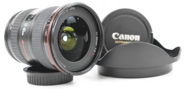 Canon 17-40mm 1:4 L USM lens to suit Canon SLR camera, with Canon front and rear caps and EW-83E