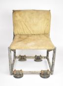 Small lightweight seat with tubular frame, cloth seat and back, possibly from a glider or similar,