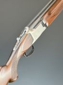 Winchester Super Grade XTR Lightweight 12 bore over and under ejector shotgun with engraved scenes
