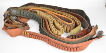 Nine leather shotgun cartridge belts suitable for .410, 20 and 12 bore including some leather.