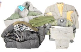 A collection of gentleman's shooting clothing comprising Brook Taverner Saxony Supreme tweed jacket,