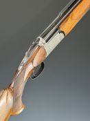 Fias 12 bore over under ejector shotgun with engraved locks, underside, trigger guard, top plate,