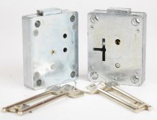 Two gun safe locks with two sets of keys.