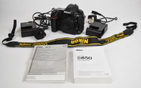 Nikon D850 digital SLR camera, with Nikon body cap, two battery chargers and instructions