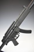 German Sport Guns (GSG) 522 .22 semi-automatic assault style rifle with textured pistol grip,