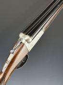 Gunmark Kestrel 12 bore side by side shotgun with named and engraved locks, engraved underside,