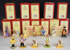 Twelve Royal Doulton Bunnykins figures including Irishman, Banjo, Juggler, Wizard, Cook etc, all