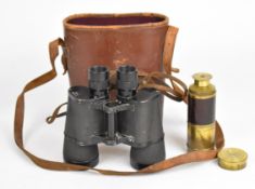 Pair of Dienstglas 7x50 binoculars, number 2243916 with leather case together with a seven draw