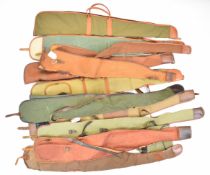 Twelve canvas and faux leather shotgun or rifle slips.