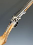 El Chimbo .410 side by side hammer action folding poacher's shotgun with chequered semi-pistol