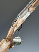 Blaser F16 12 bore over under ejector shotgun with named locks and underside, chequered semi-