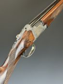 Browning Custom 12 bore over and under ejector shotgun with engraved scenes of birds and dogs to the
