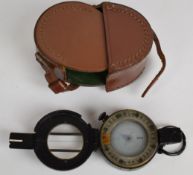 British WW2 prismatic compass, EAC No.8, MkIII dated 1944 with broad arrow mark and leather case