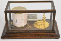 H. Blackman & Son, Rugby oak cased barograph with Short & Mason cyclo-stormoguide chart to rear,