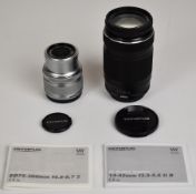 Two Olympus M.Zuiko digital camera lenses comprising 14-42mm 1:3.5-5.6 II R and ED 75-300mm 1:4.8-