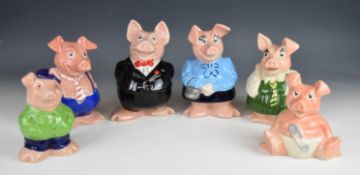 Set of Wade Natwest pigs with stoppers, including Cousin Wesley, tallest 8cm Provenance:- the vendor